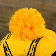 The Pom Pom on the C3PO Rebel Alliance Cuffed Logo Winter Beanie With Pom Pom | Yellow Winter Beanie