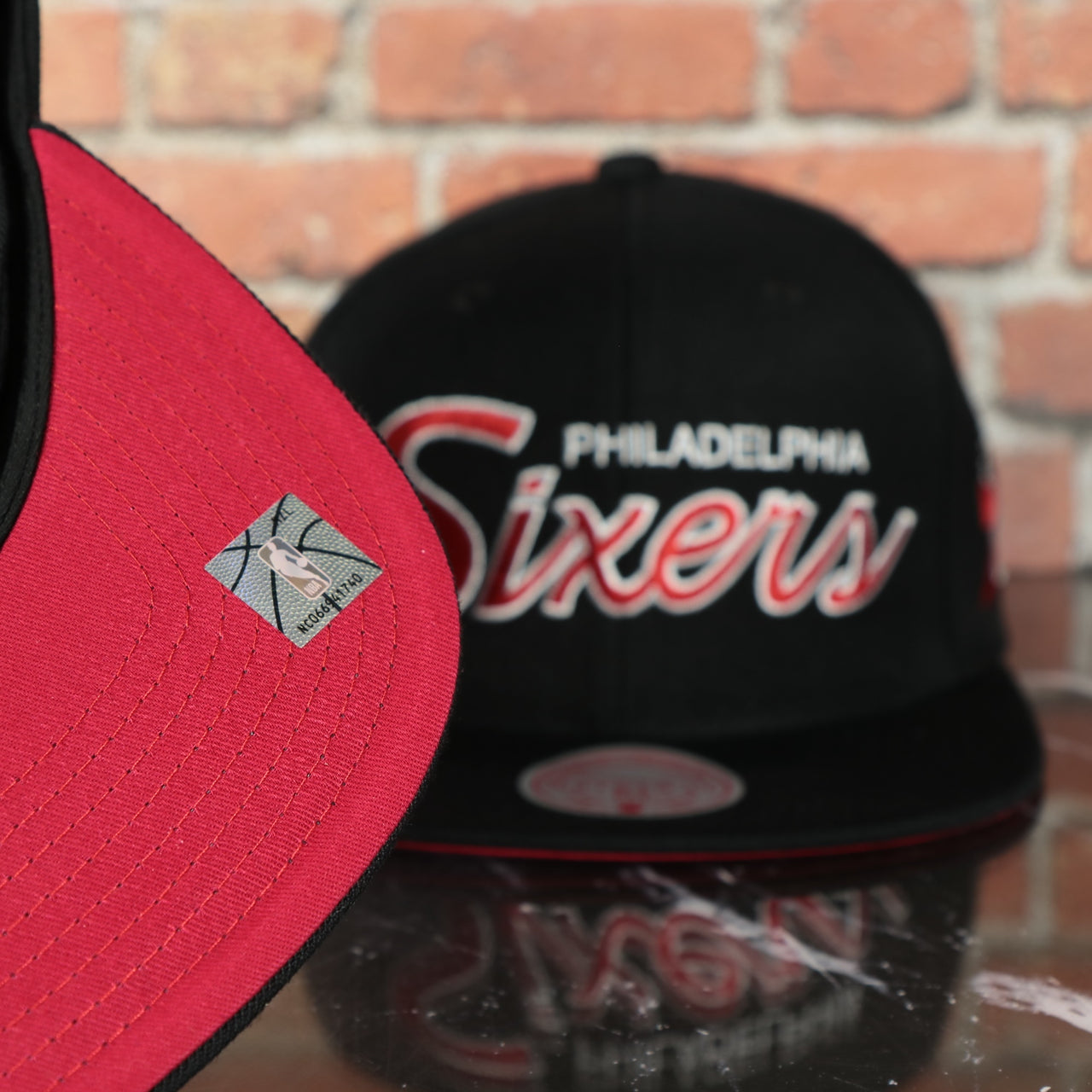 red under visor on the Philadelphia 76ers Vintage Retro NBA Team Script 2.0 Mitchell and Ness Snapback Hat | Black