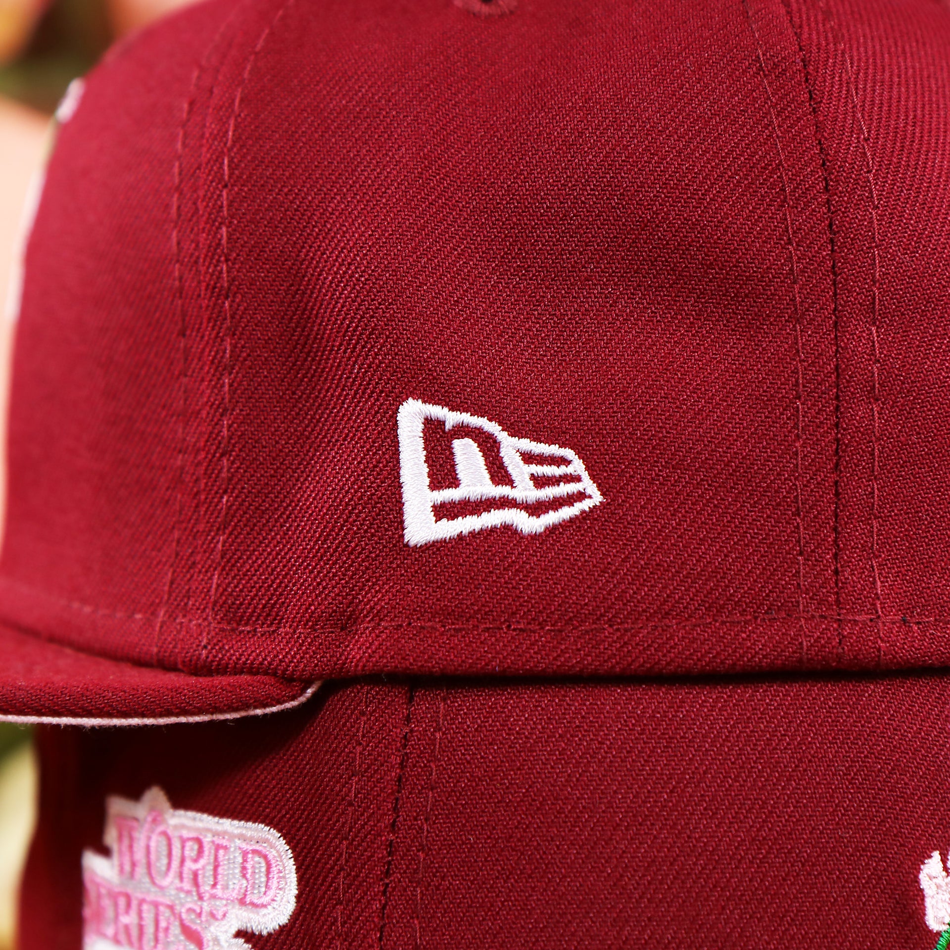 The New Era Logo on the Cooperstown Philadelphia Philadelphia Pink Undervisor Sakura Tree Embroidered 59Fifty Fitted Cap | Maroon 59Fifty Cap