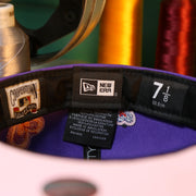 The Tags on the Cooperstown Arizona Diamondbacks All Over Embroidered Chain Stitch Heart Pink Bottom 59Fifty Fitted Cap | Purple 59Fifty Cap