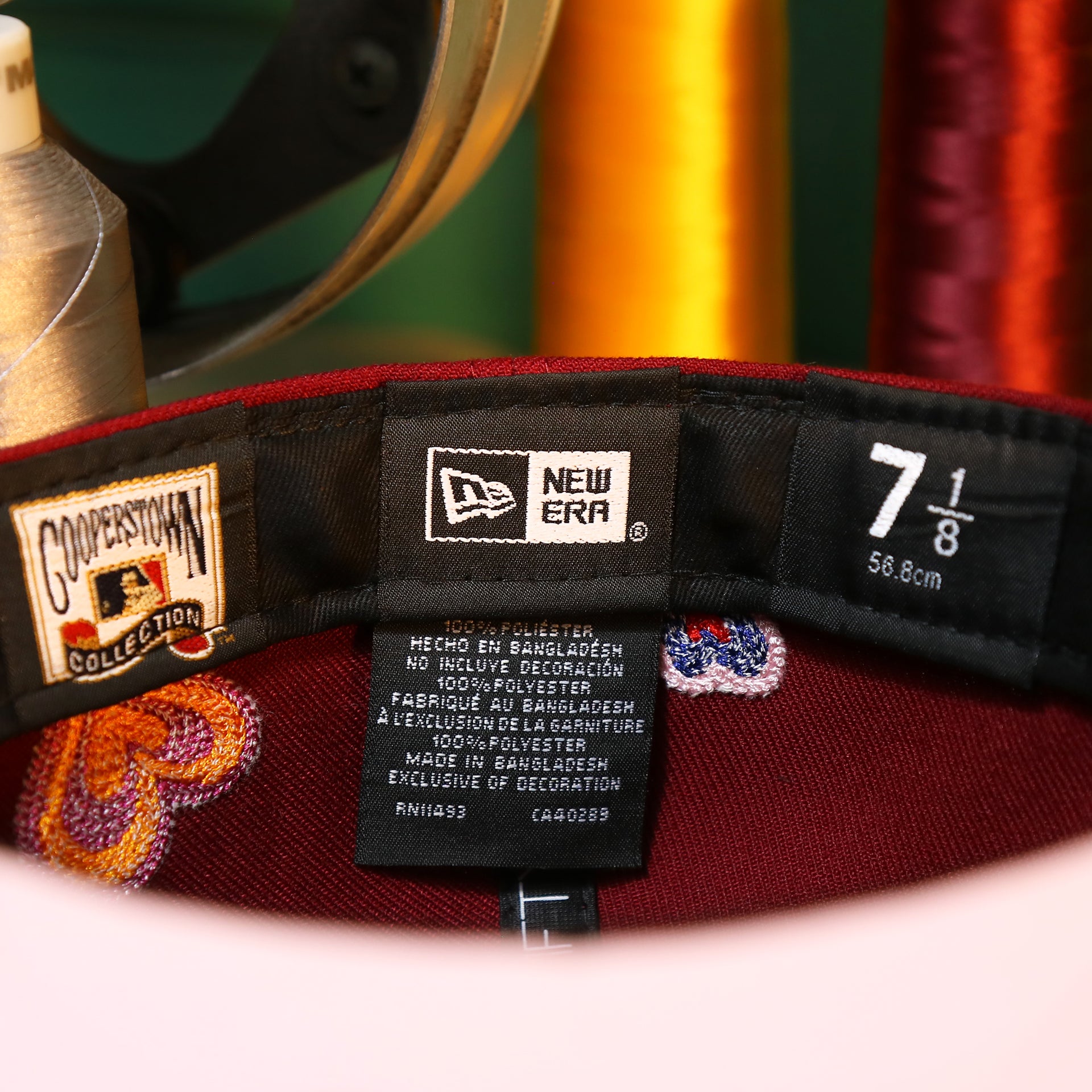 The Tags on the Cooperstown Philadelphia Phillies All Over Embroidered Chain Stitch Heart Pink Bottom 59Fifty Fitted Cap | Maroon 59Fifty Cap