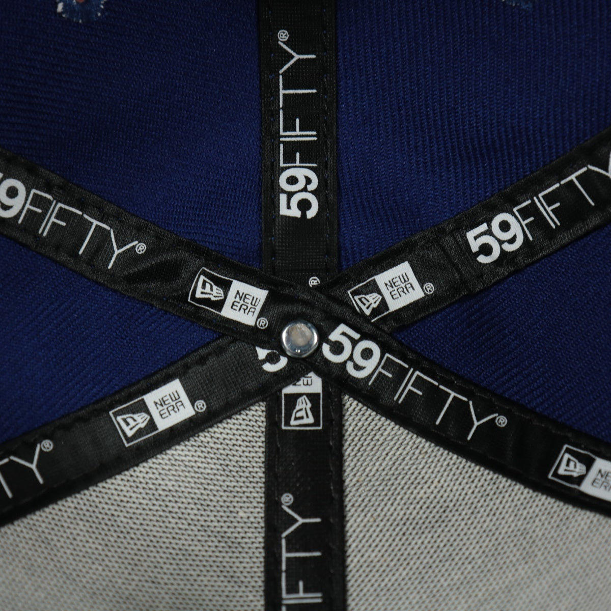 new era taping on the Los Angeles Dodgers Iced Out Side Patch Flower Star Gray Bottom Crystal Icons 59Fifty Fitted Cap