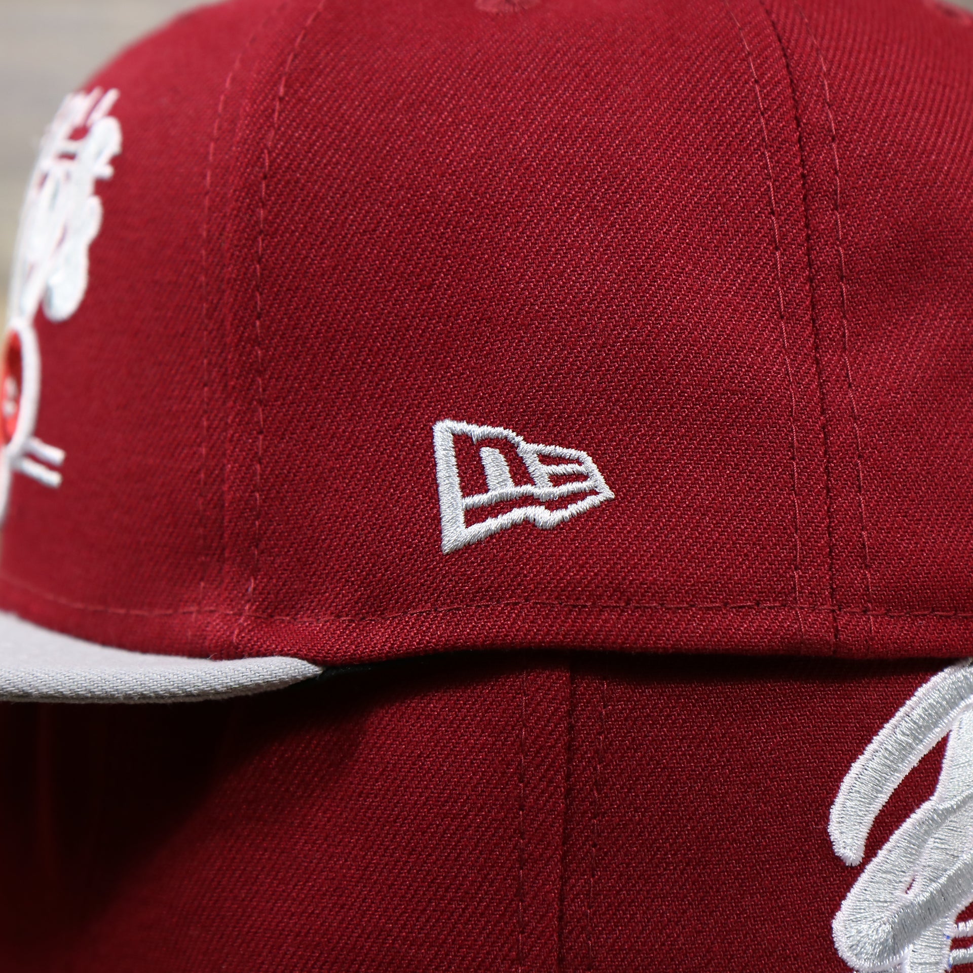 The New Era Logo on the Philadelphia Phillies Team Script Gray Bottom 9Fifty Snapback | Maroon And Grey Snap Cap