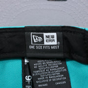 The New Era Tag on the Miami Dolphins Team Script Gray Bottom 9Fifty Snapback | Aqua and Orange Snap Cap