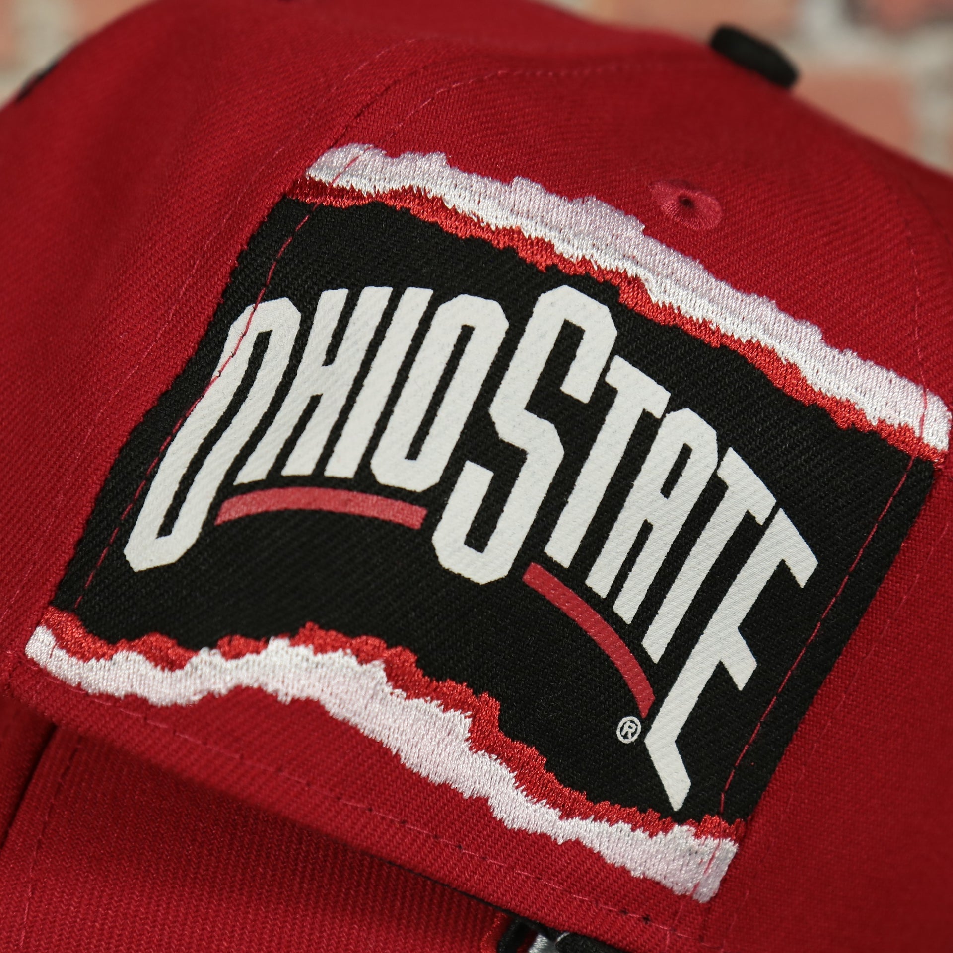 ohio state jumbotron side patch on the Ohio State Buckeyes NCAA Jumbotron "Ohio State" Ripped Wordmark side patch Grey Bottom Red/Black Snapback hat | Mitchell and Ness Two Tone Snap Cap