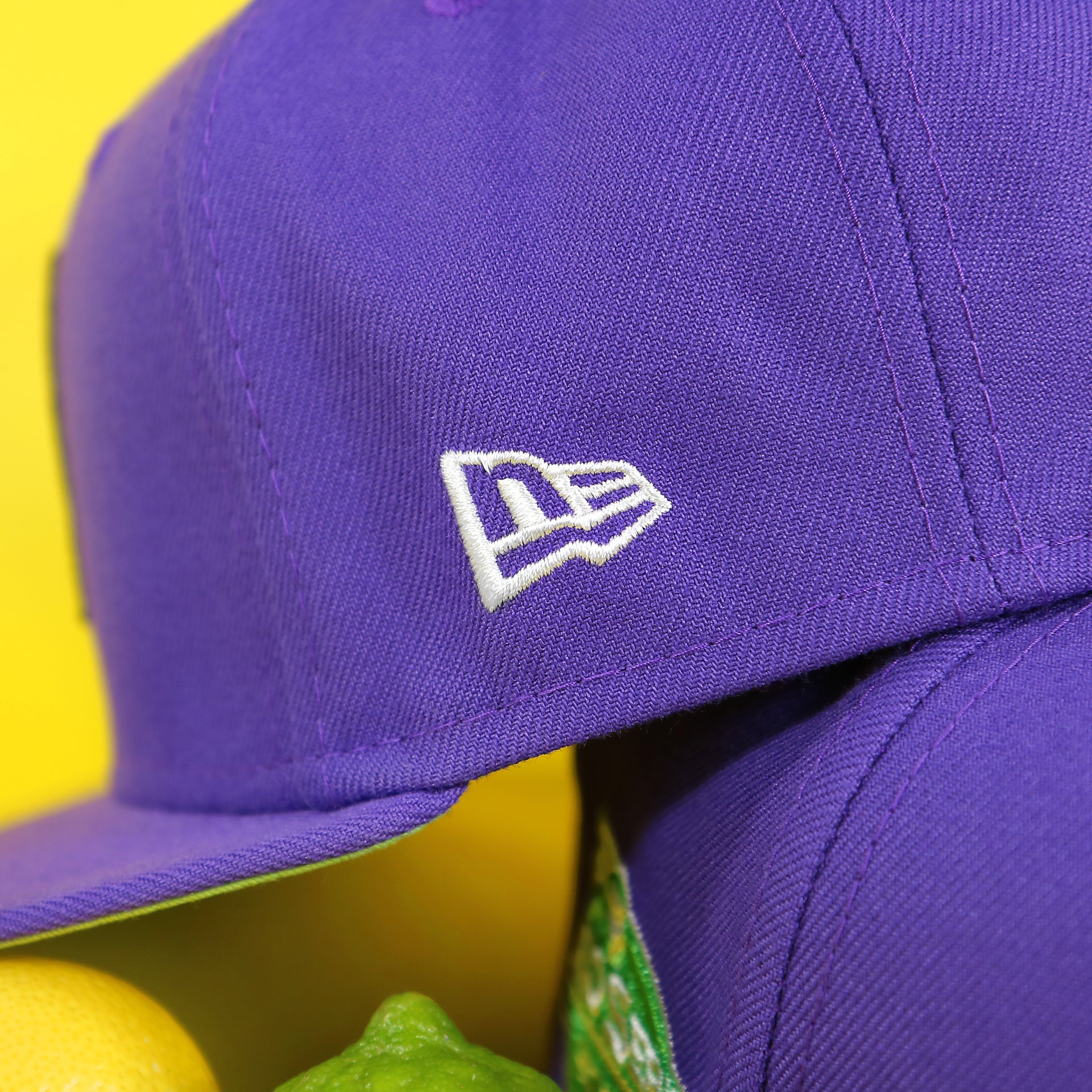 Close up of the New Era flag on the Arizona Diamondbacks Cooperstown 2001 World Series Side Patch "Citrus Pop" Green UV 59Fifty Fitted Cap