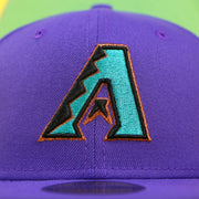 Close up of the Arizona Diamondbacks logo on the Arizona Diamondbacks Cooperstown 2001 World Series Side Patch "Citrus Pop" Green UV 59Fifty Fitted Cap