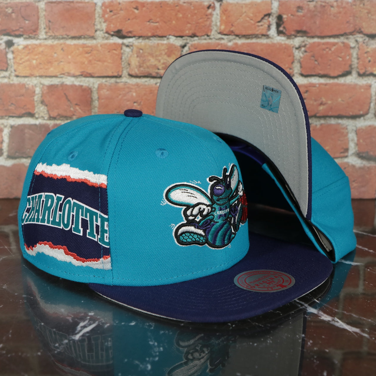 Charlotte Hornets Hardwood Classics Jumbotron "Charlotte" Ripped Wordmark side patch Grey Bottom Teal/Purple Snapback hat | Mitchell and Ness Two Tone Snap Cap