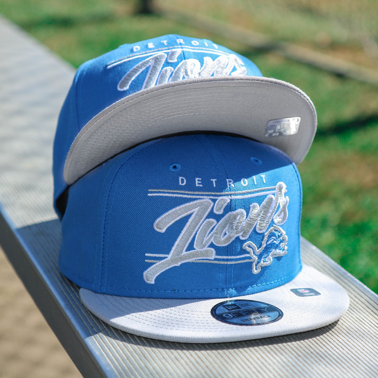 The Detroit Lions Team Script Gray Bottom 9Fifty Snapback | Blue and Gray Snap Cap