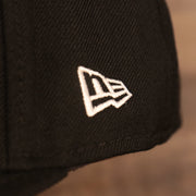 Close up of the New Era logo on the Florida Marlins Retro Cooperstown Iced Out Side Patch Orange Florida Gray Bottom 59Fifty Fitted Cap