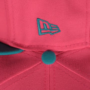 new era logo on the Lehigh Valley Ironpigs Coqui Copa De La Diversion 2023 Two-Tone Black Bottom 9Fifty Snapback Hat | Pink/Blue 950