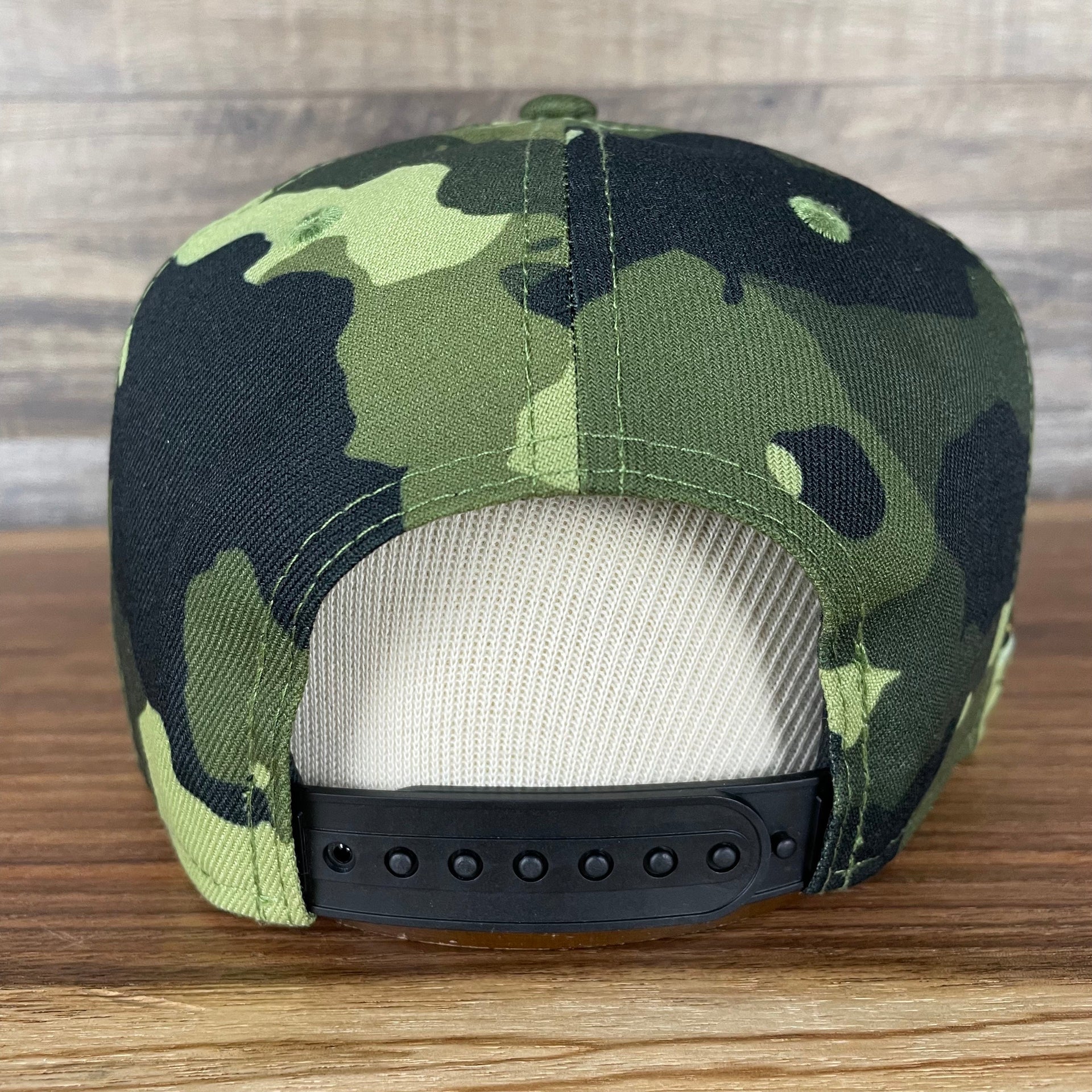 The backside of the New York Mets 2022 Armed Forces Day / Memorial Day Side Patch 9Fifty Snapback Cap