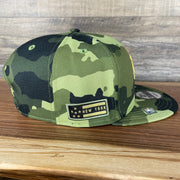 The wearer's right on the New York Mets 2022 Armed Forces Day / Memorial Day Side Patch 9Fifty Snapback Cap