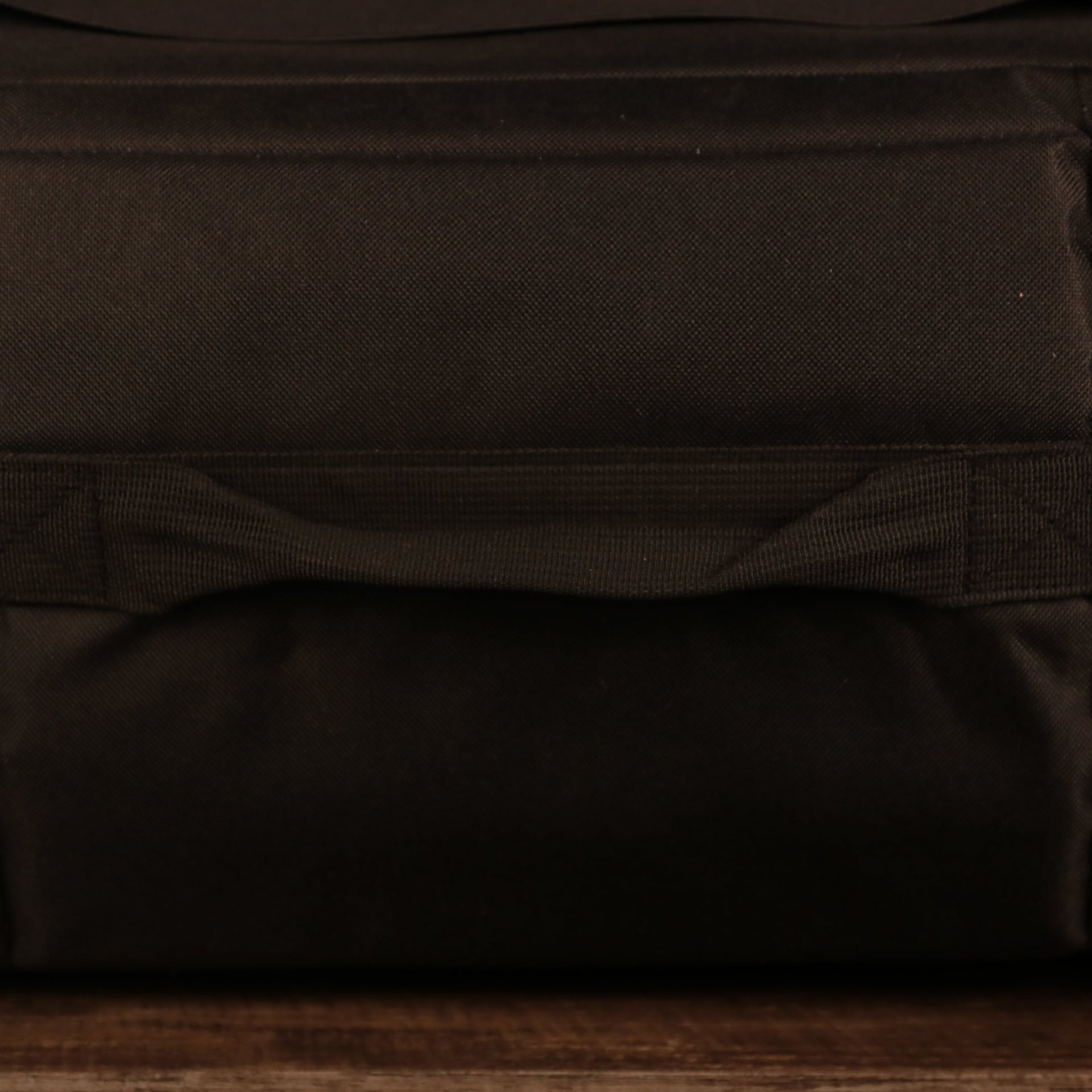 Close up of the top handle for the 24 Pack Cap Carrier | Portable Cap Storage and Cap Travel Bag