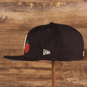 Wearer's left on the New York Yankees Iced Out Side Patch Apple Statue of Liberty Gray Bottom 59Fifty Fitted Cap