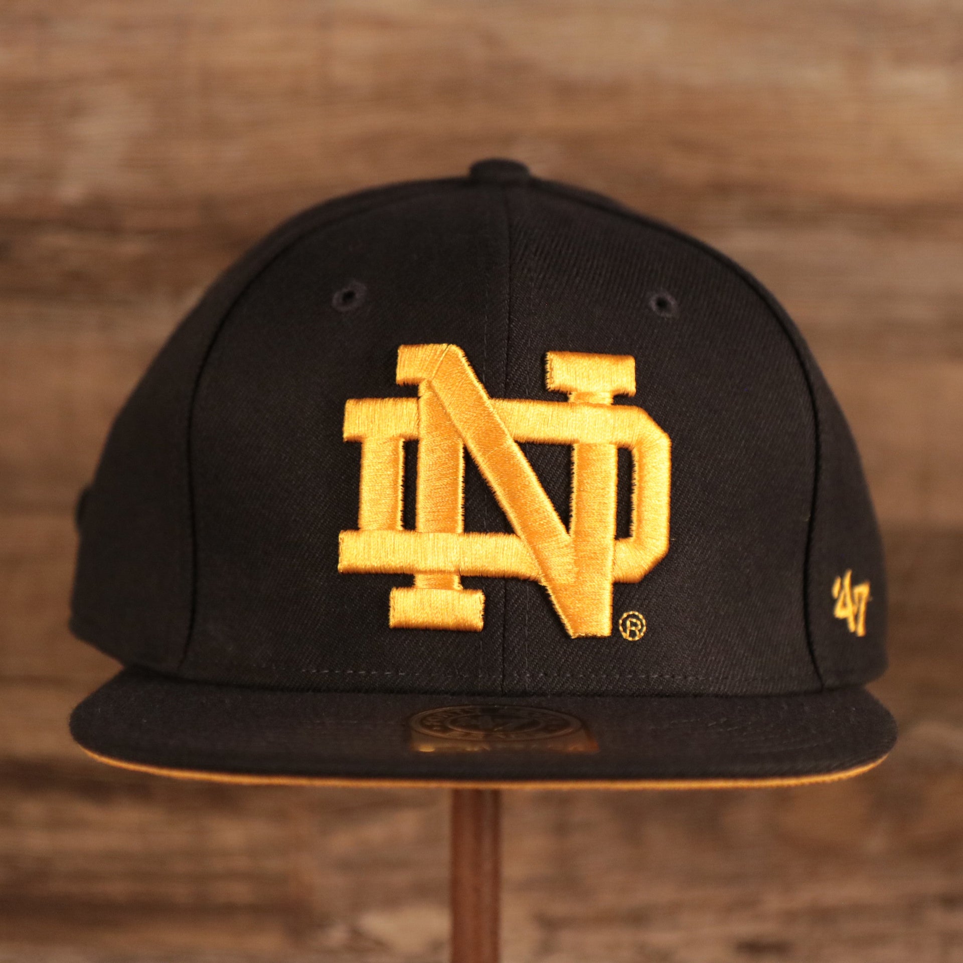 47 BRAND | NOTRE DAME FIGHTIN IRISH | THE SHAFT | GOLD UNDERBRIM W/ NOTRE DAME SCRIPT | ADJUSTABLE STRAPBACK | NAVY | OSFM