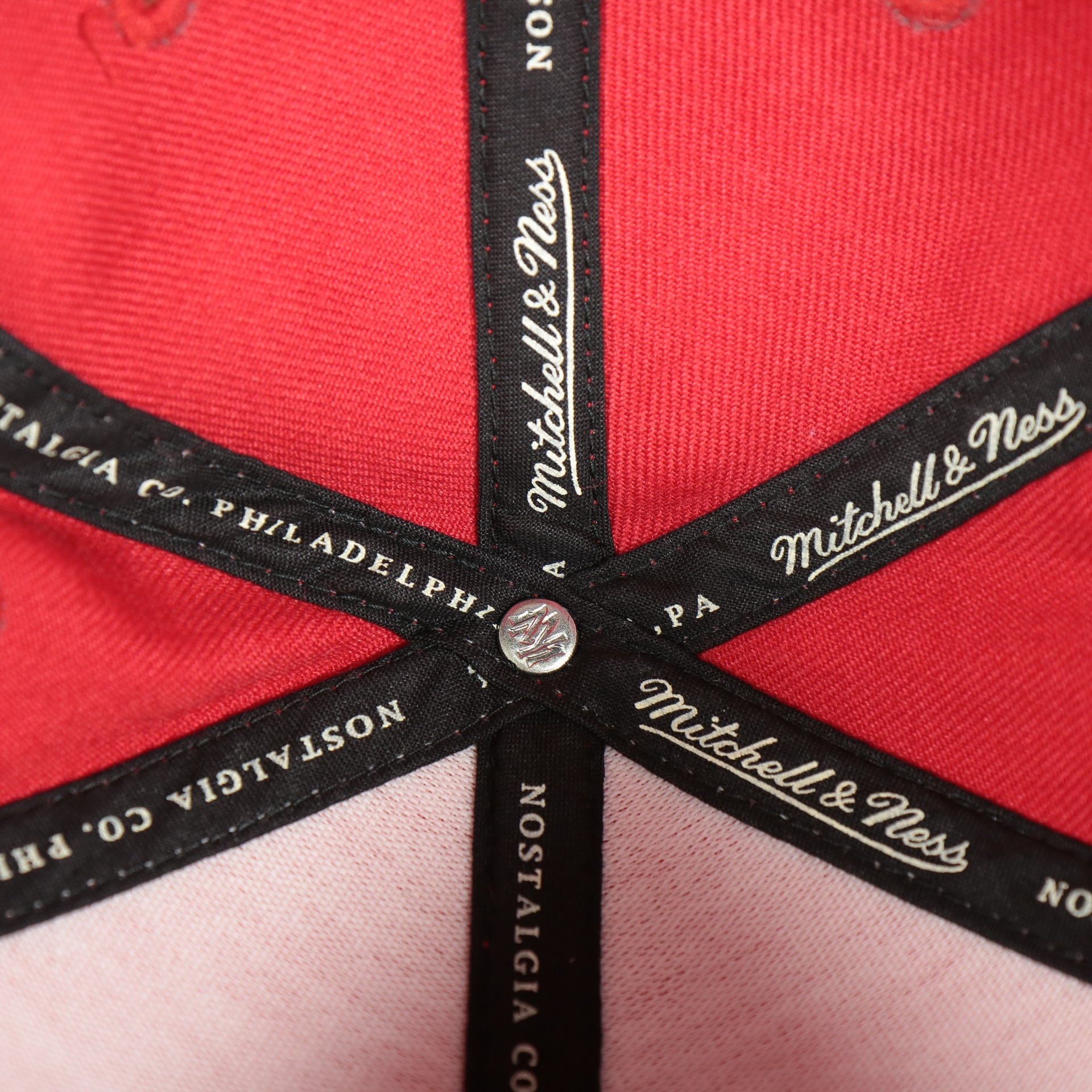 mitchell and ness taping on the Washington Capitals 2-Tone Fitted Cap Green Bottom | Blue/Red Cap