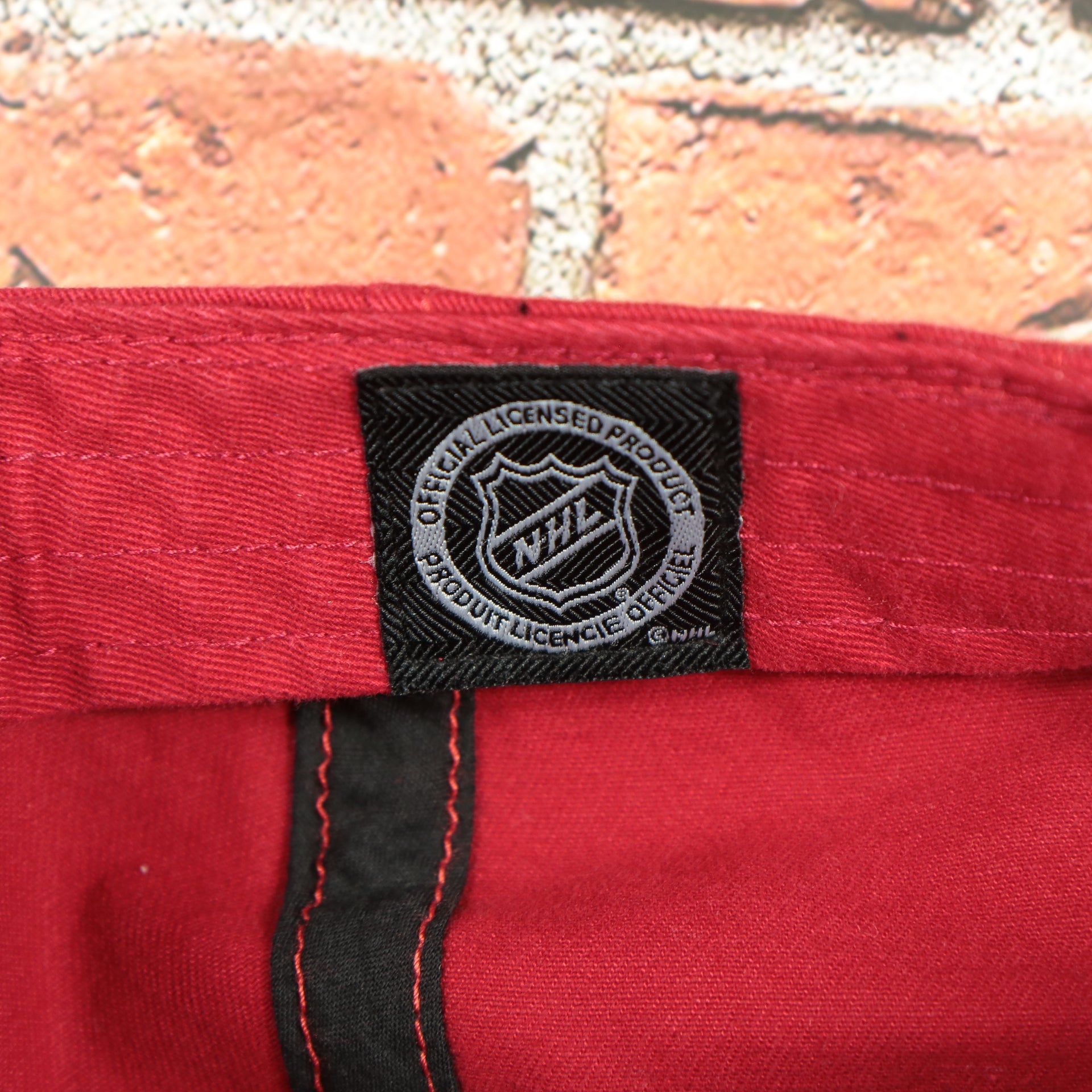 nhl label on the Montreal Canadiens Red Adjustable Baseball Cap