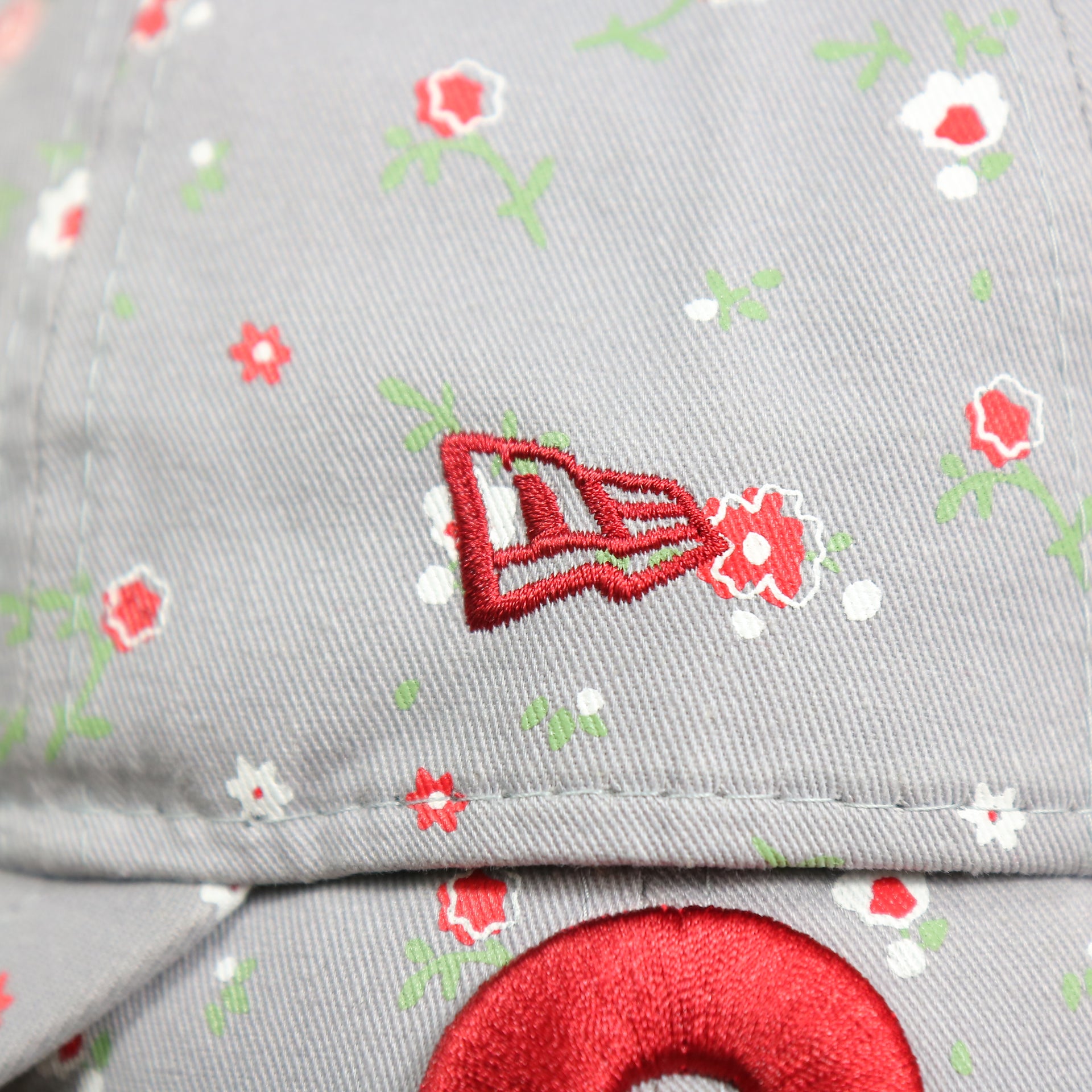 new era logo on the Philadelphia Phillies Ladies Cooperstown Floral Bloom Micro Flower Pattern 9Twenty Dad Hat | Womens Floral Phillies Hat