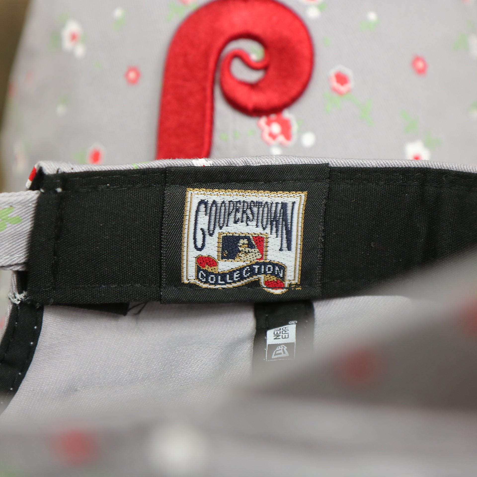 MLB cooperstown collection tag on the Philadelphia Phillies Ladies Cooperstown Floral Bloom Micro Flower Pattern 9Twenty Dad Hat | Womens Floral Phillies Hat