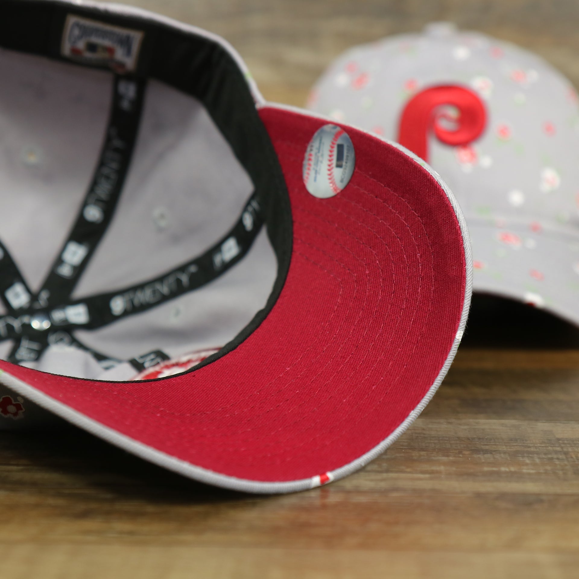 red under visor on the Philadelphia Phillies Ladies Cooperstown Floral Bloom Micro Flower Pattern 9Twenty Dad Hat | Womens Floral Phillies Hat