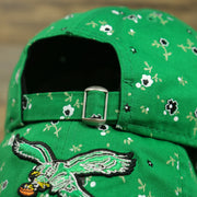 metallic buckle and adjustable strap on the Philadelphia Eagles Ladies Throwback Logo Floral Bloom Micro Flower Pattern 9Twenty Dad Hat | Womens Floral Eagles Hat