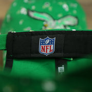 NFL label on the Philadelphia Eagles Ladies Throwback Logo Floral Bloom Micro Flower Pattern 9Twenty Dad Hat | Womens Floral Eagles Hat