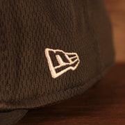 Close up of New Era logo on the Pittsburgh Steelers NFL 2021 Crucial Catch Breast Cancer Awareness 9Fifty Snapback Hat