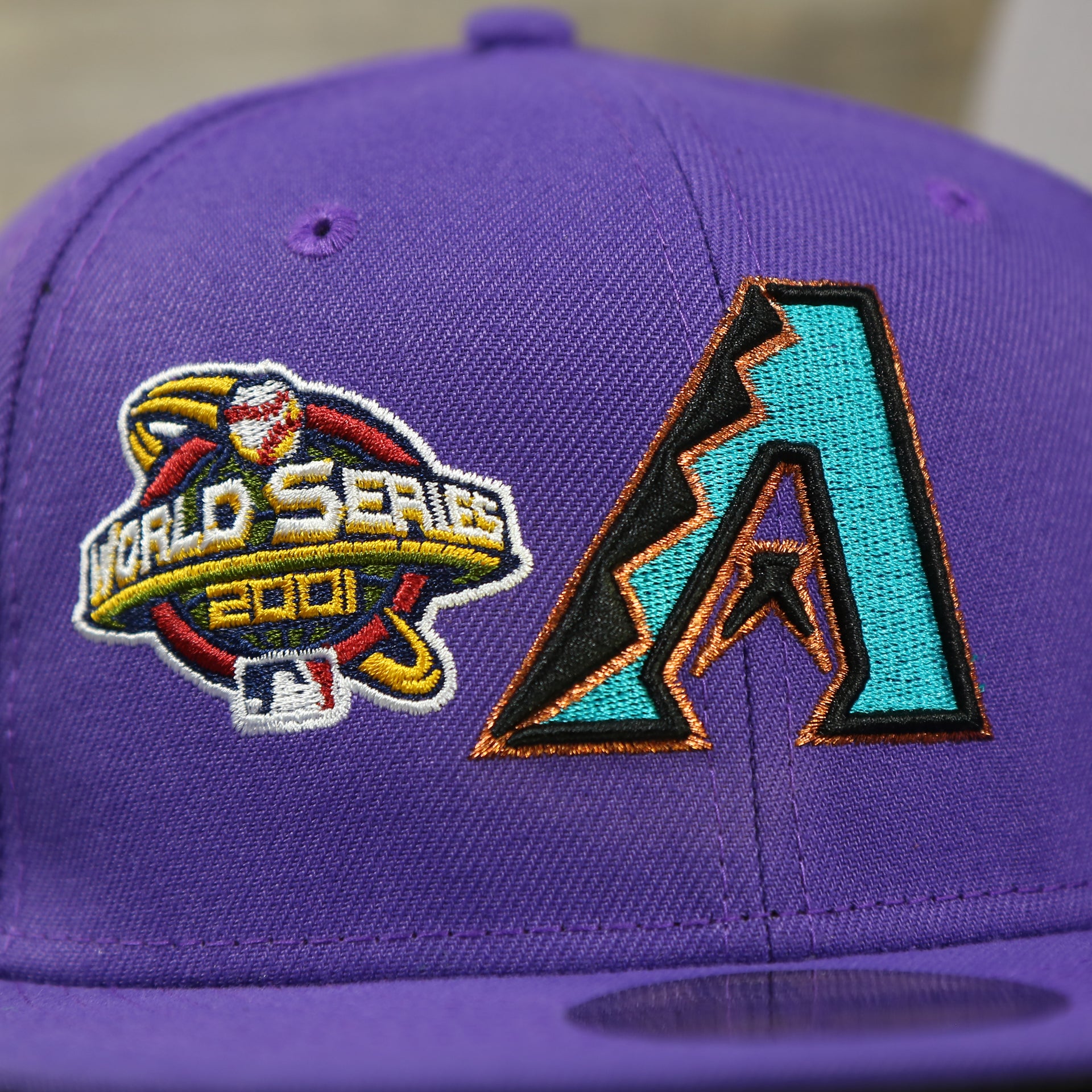 2001 world series patch and diamondbacks logo on the Arizona Diamondbacks Cooperstown All Over Side Patch "Historic Champs" Gray UV 59Fifty Fitted Cap | Purple 59Fifty Fitted Cap