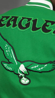eagles logo on the Philadelphia Eagles Retro NFL "Eagles" Script Retro Classic Rib | Kelly Green/White Wool Varsity Jacket