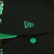 new era logo on the Philadelphia Eagles Vintage Team Script College Bar Gray Bottom 9Fifty Snapback | Black/Kelly Green Birds 950 Snap Cap