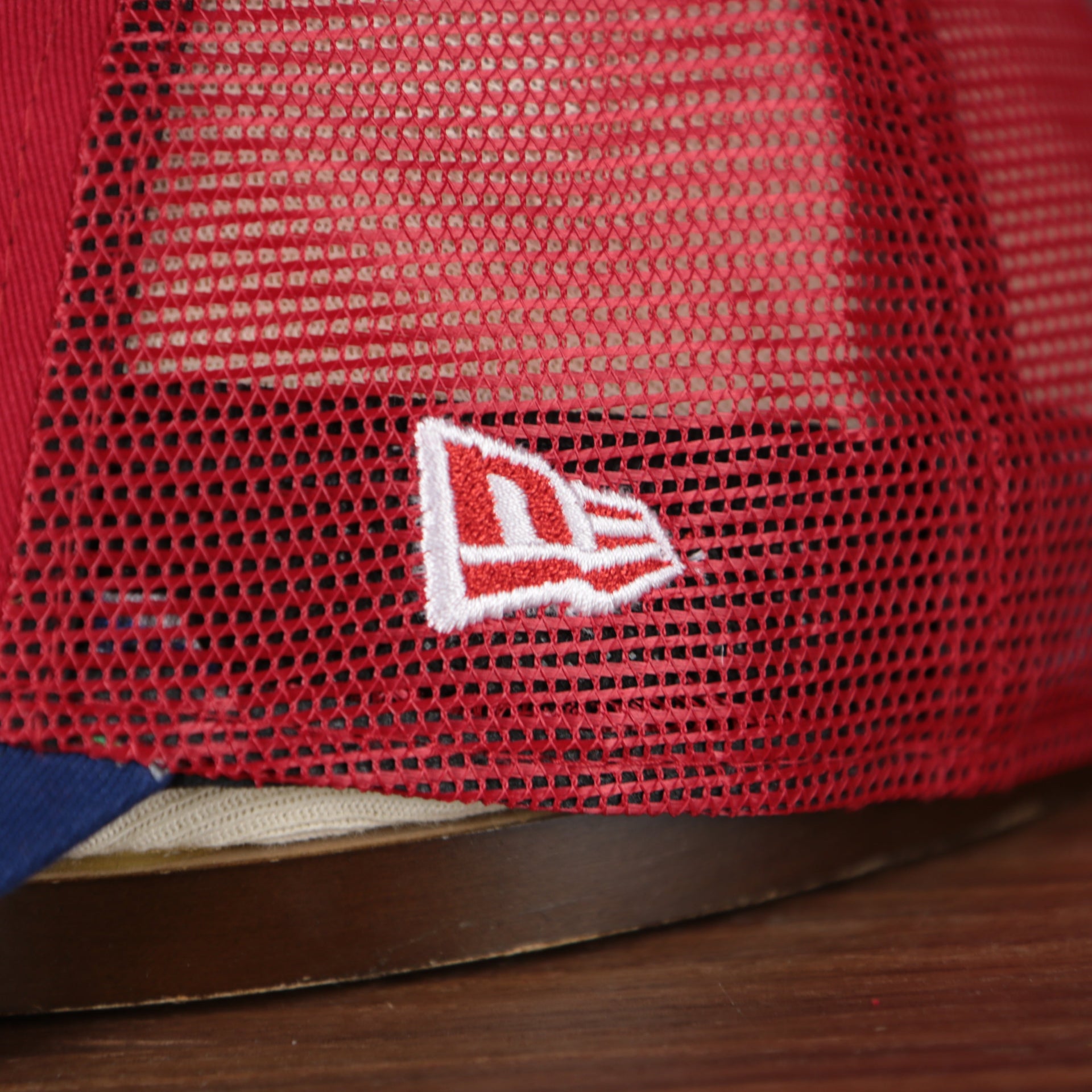 Close up of the New Era flag on the wearer's left of the Philadelphia Phillies 2022 MLB Batting Practice On-Field Spring Training 9Twenty Trucker Dad Hat