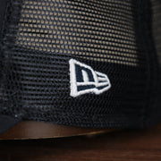 Close up of the New Era logo on the wearer's left of the New York Yankees 2022 MLB Batting Practice On-Field Spring Training 9Twenty Trucker Dad Hat