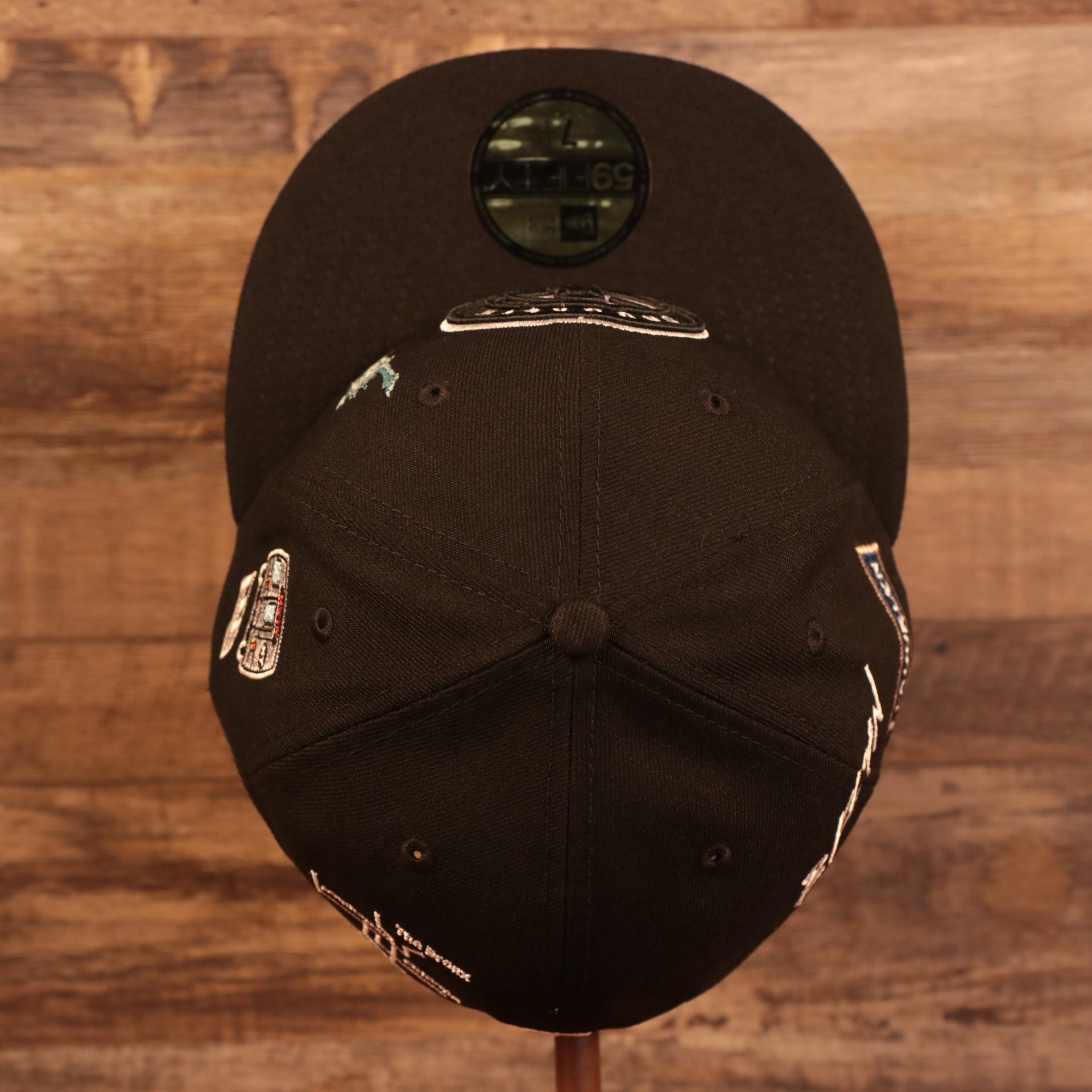 Top down view of the Brooklyn Nets City Transit All Over Side Patch Gray Bottom 59Fifty Fitted Cap