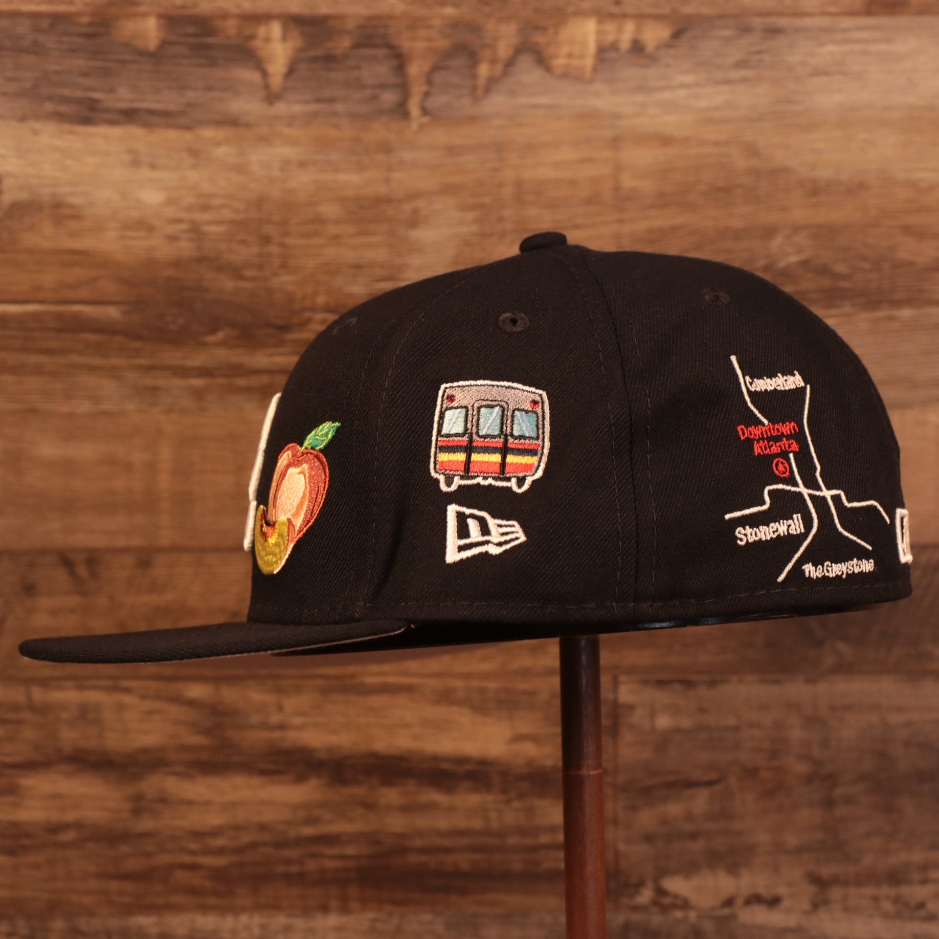 Wearer's left of the Atlanta Braves City Transit All Over Side Patch Gray Bottom 59Fifty Fitted Cap