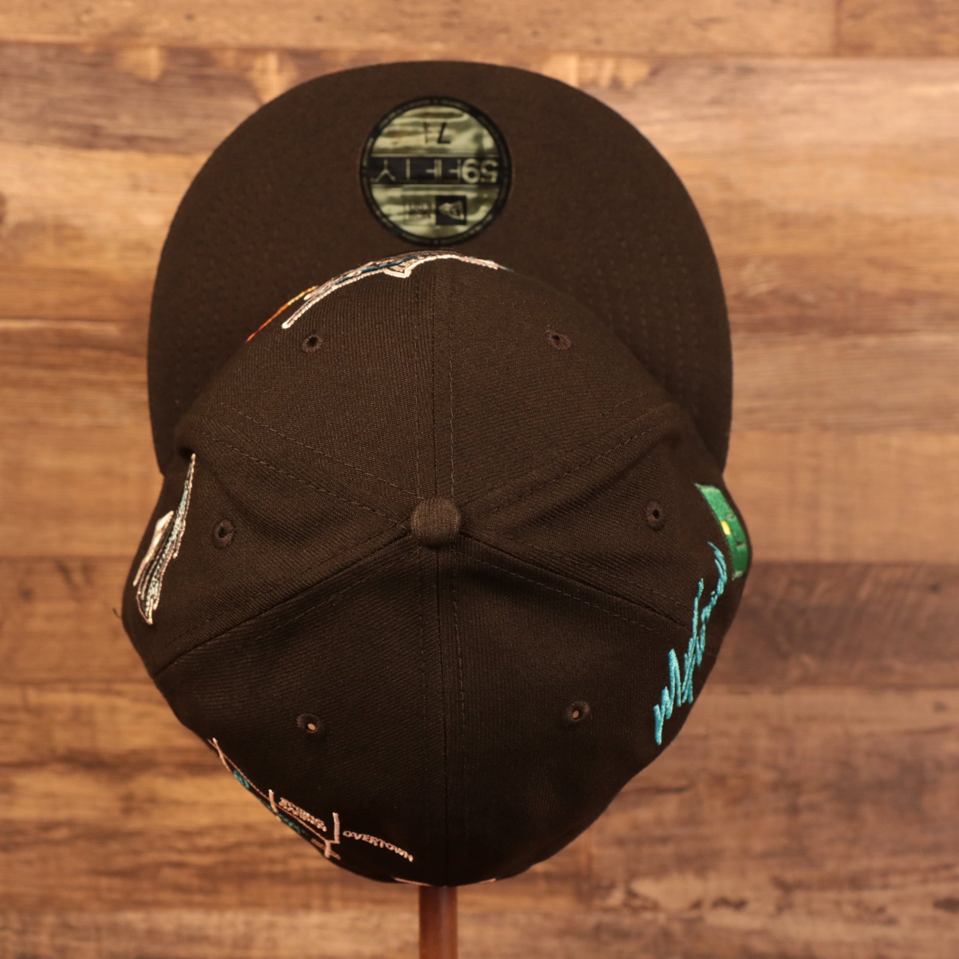Top down view of the Florida Marlins Cooperstown City Transit All Over Side Patch Gray Bottom 59Fifty Fitted Cap