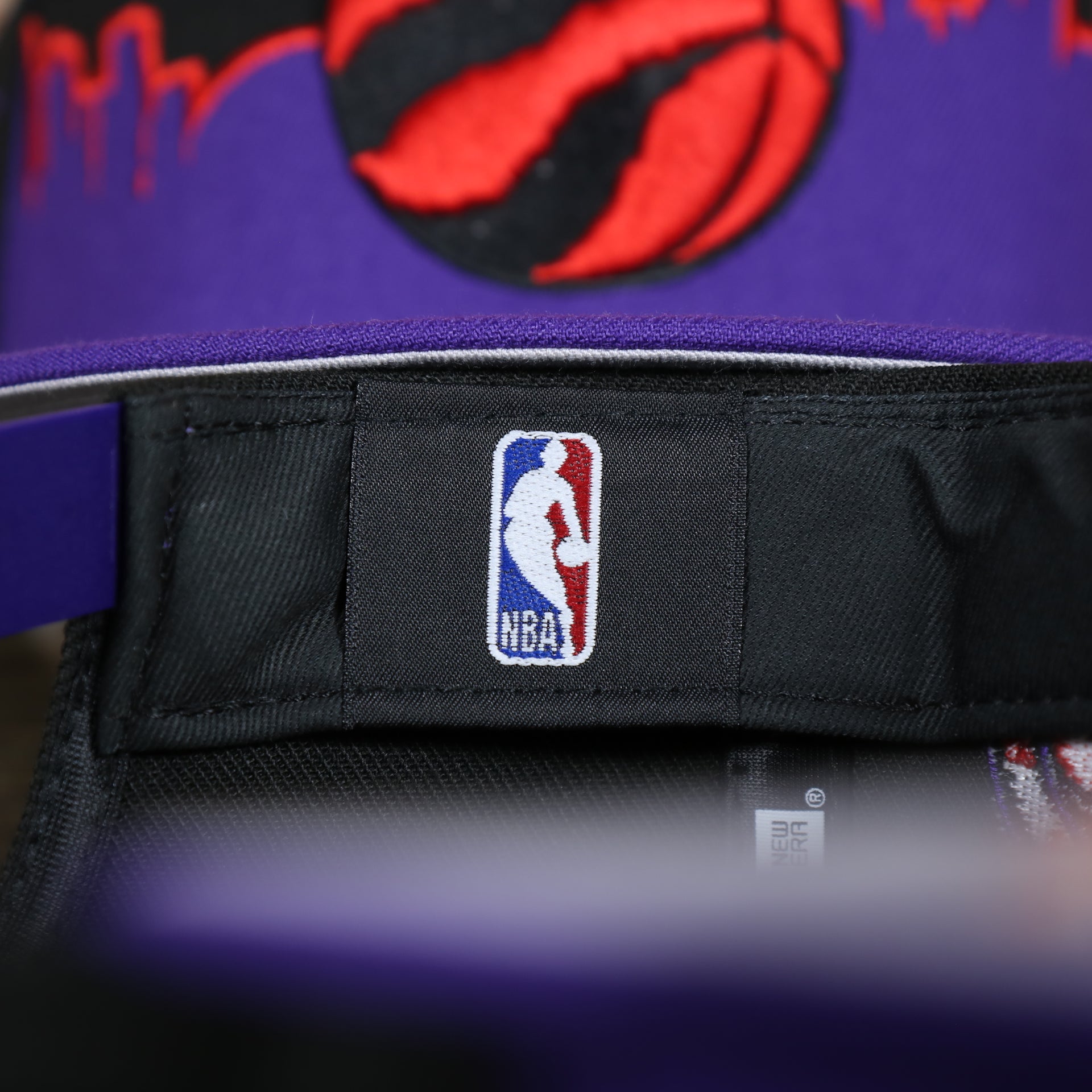 nba label on the Toronto Raptors City Skyline Side Patch 9Fifty Snapback Hat | Toronto Skyline 950