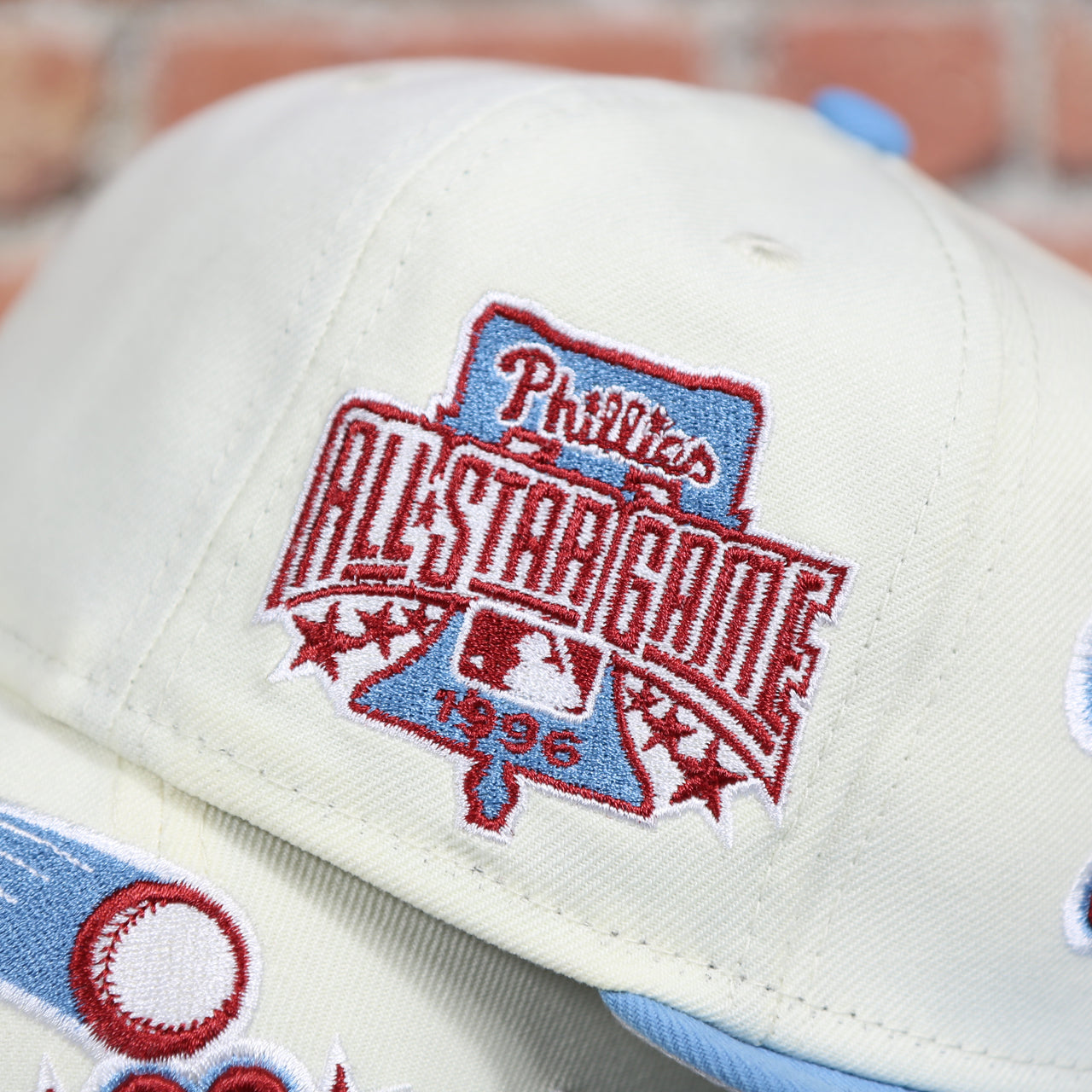 Close up of the 1996 All Star Game side patch on the Philadelphia Phillies Cooperstown Jersey Script Wordmark 1996 All Star Game Side Patch Grey UV 59Fifty Fitted Cap | Chrome/Powder Blue nohiosafariclub Exclusive