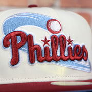 Close up of the Phillies wordmark on the Philadelphia Phillies Cooperstown Jersey Script Wordmark 1996 All Star Game Side Patch Powder Blue UV 59Fifty Fitted Cap | Chrome/Maroon nohiosafariclub Exclusive
