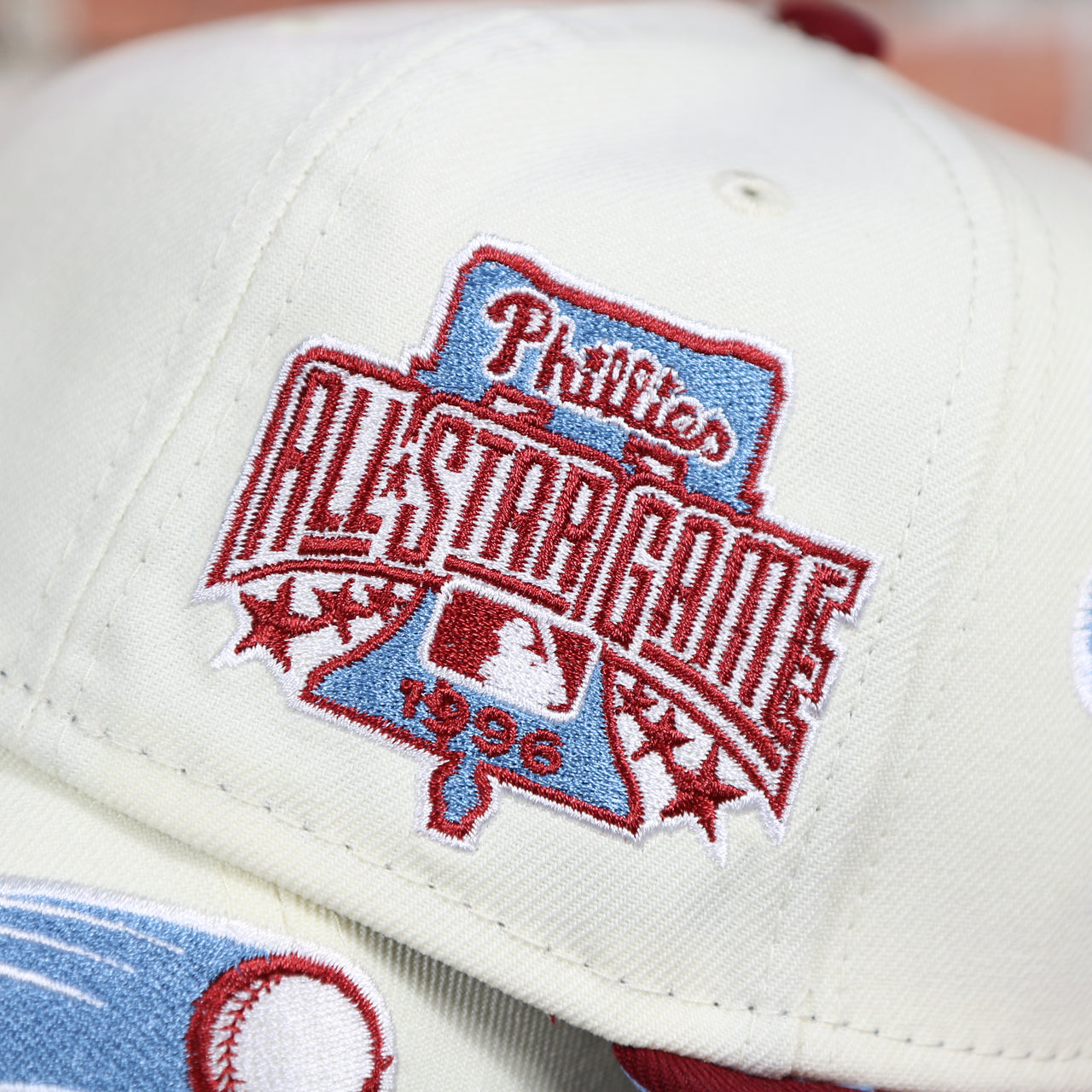 Close up of the 1996 All Star Game Side Patch on the Philadelphia Phillies Cooperstown Jersey Script Wordmark 1996 All Star Game Side Patch Powder Blue UV 59Fifty Fitted Cap | Chrome/Maroon nohiosafariclub Exclusive
