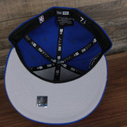 underside of the Philadelphia 76ers All Over Paisley Bandana Pattern Grey Bottom 5950 Fitted Cap | Blue