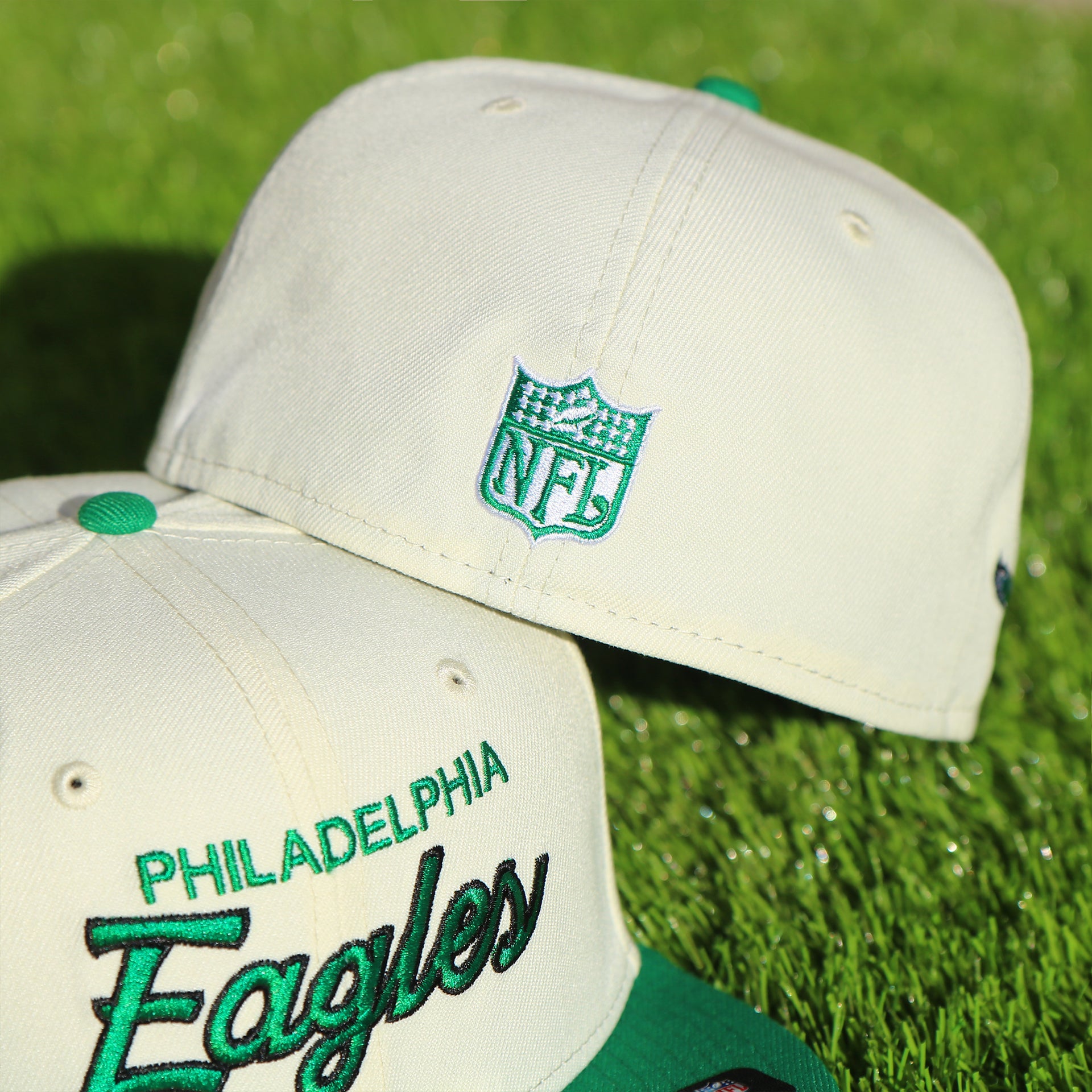 Back of the Philadelphia Eagles Throwback Wordmark Jersey Script Cream/Kelly Green Black UV Side Patch 59Fifty Fitted Cap | nohiosafariclub Exclusive featuring the retro NFL shield