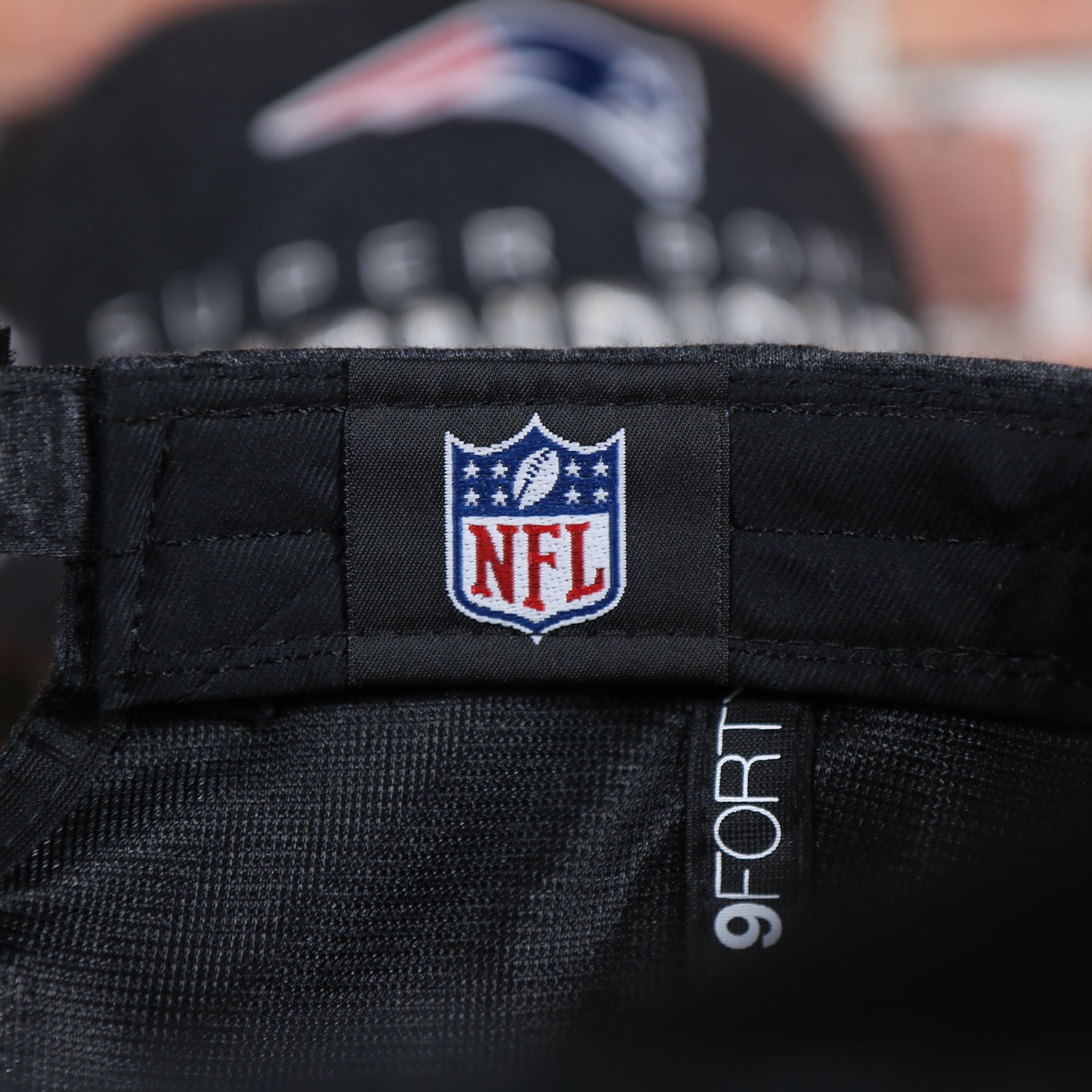 nfl label  on the New England Patriots Locker Room Super Bowl LI Championship Trophy 9Forty Dad Hat