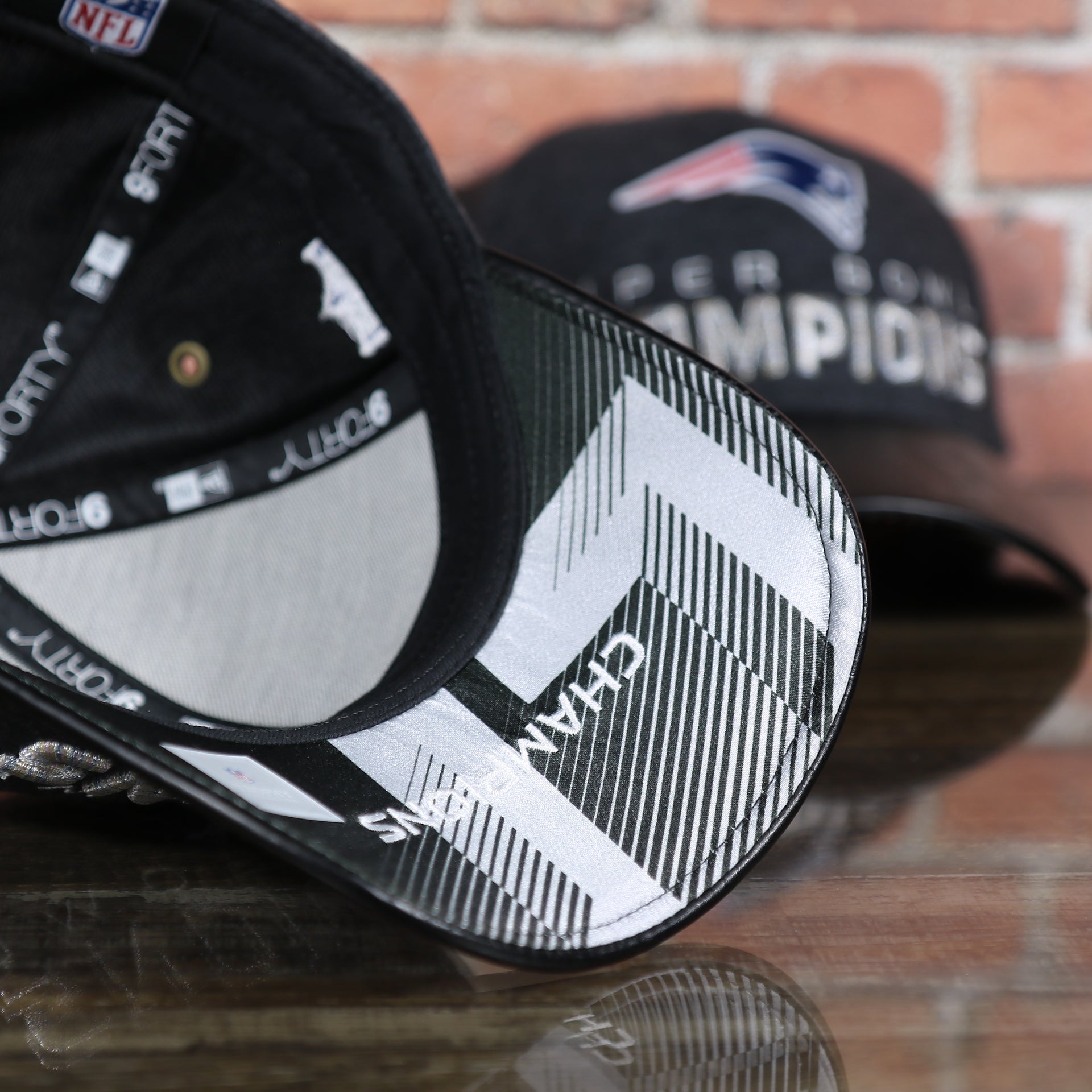 under visor of the New England Patriots Locker Room Super Bowl LI Championship Trophy 9Forty Dad Hat