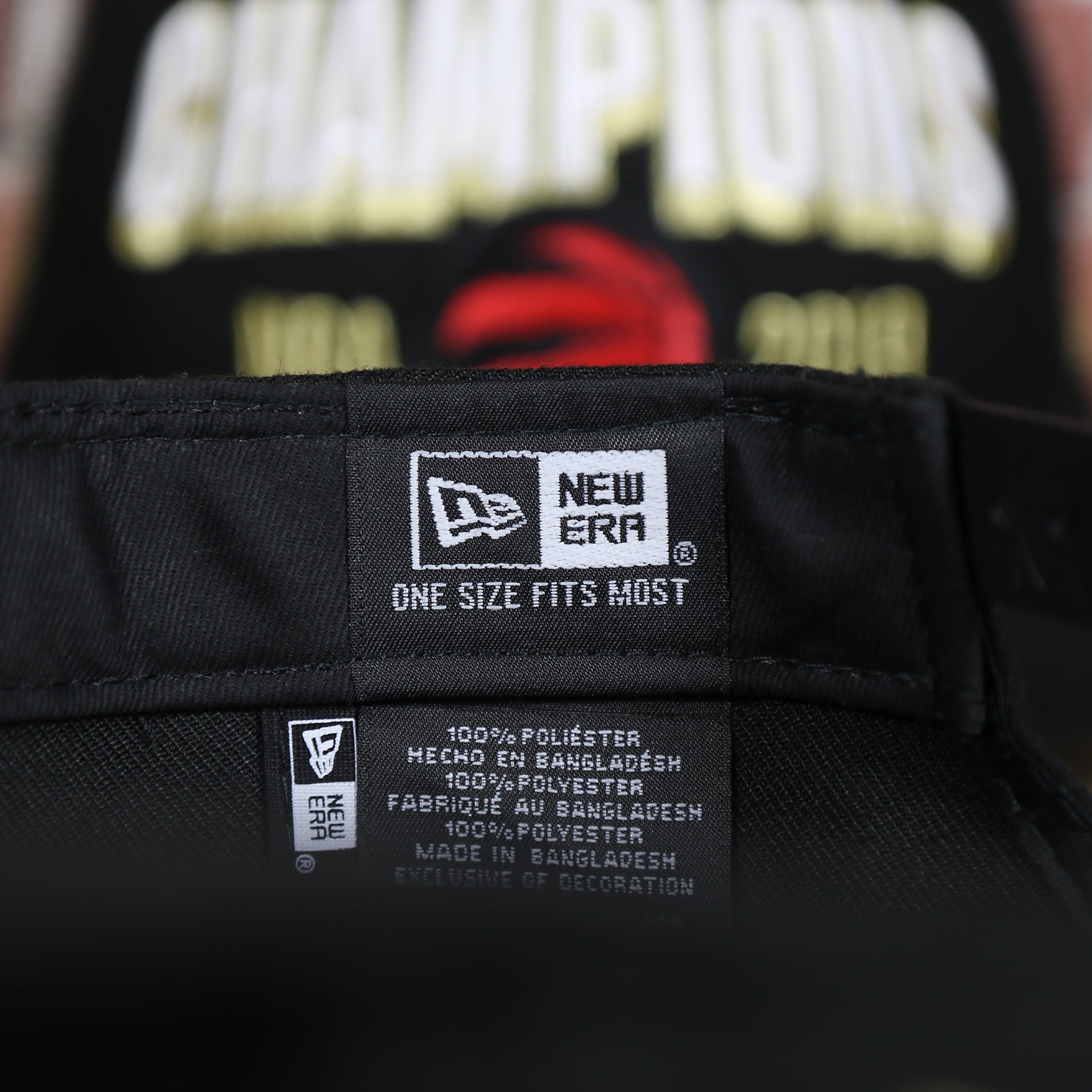 new era label on the Men's Toronto Raptors New Era Black 2019 NBA Finals On Court Champions Locker Room 9FIFTY Snapback Hat