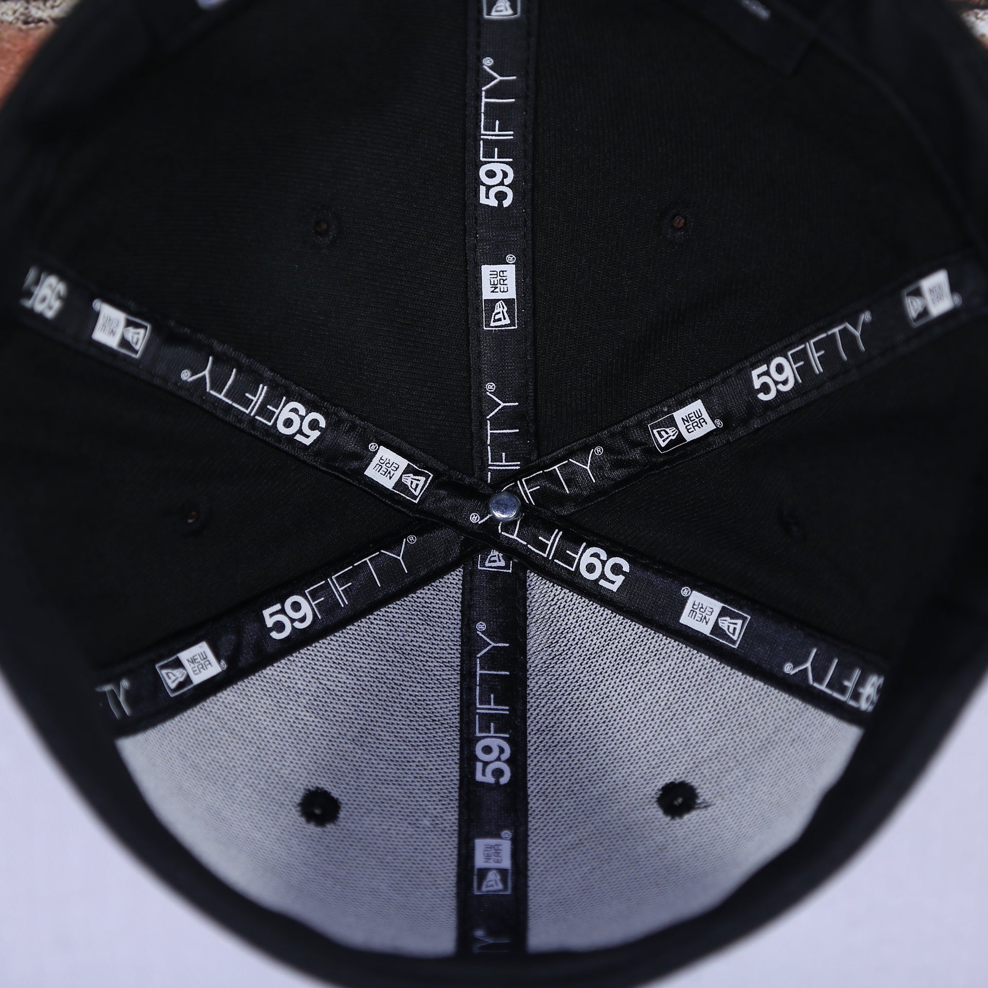 inside taping on the inside of the NFL On-Field Referee Official 59Fifty Fitted Cap | Black