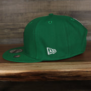 wearers left side of the Boston Celtics 2021 City Edition Vintage Grey Bottom 9Fifty Snapback | Green