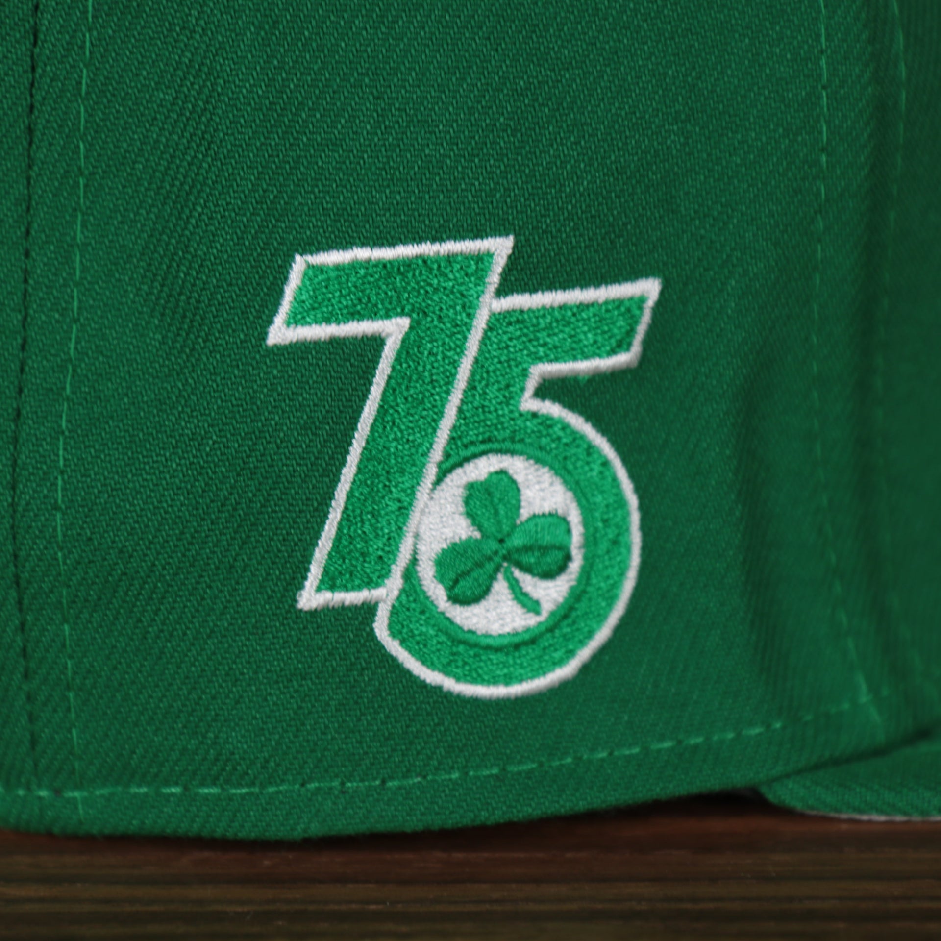 75 anniversary logo on the Boston Celtics 2021 City Edition Vintage Grey Bottom 9Fifty Snapback | Green