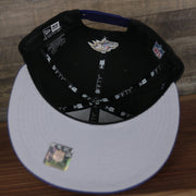underside of the Baltimore Ravens 2022 NFL Draft 9Fifty Grey Bottom On-Field Snapback | Black