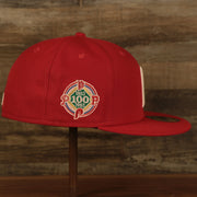 Wearer's right of the Philadelphia Phillies Glow In The Dark 100th Anniversary Teal Bottom Side Patch 59Fifty Fitted Cap